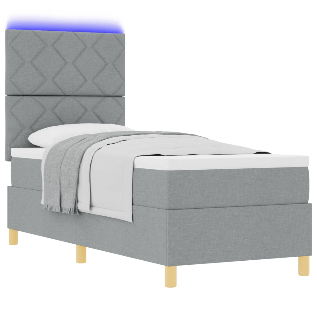 Letto box spring con materasso e LED grigio chiaro 80x200 cm tessuto