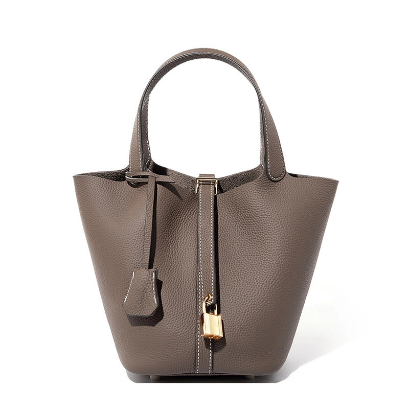 Borsa a mano da donna in vera pelle, a tracolla, modello tote bag, colore grigio.