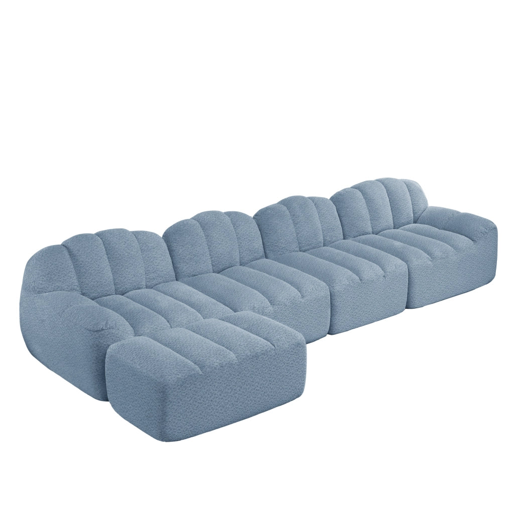 Divano modulare 4 posti con ottomana; design senza struttura in fleece granulato blu