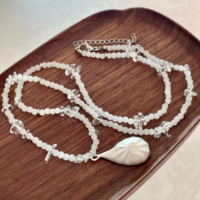 Collana di conchiglie con perline fatta a mano: un regalo vintage con gioielli in cristallo