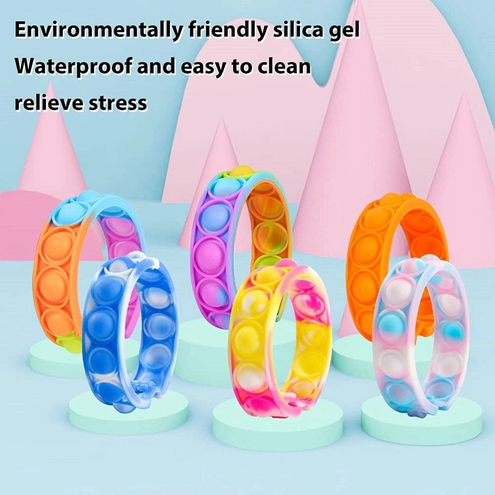 Trade Shop - 6 Braccialetti Antistress Arcobaleno Bolle Aria In Silicone Gioco Bambini Adulti -