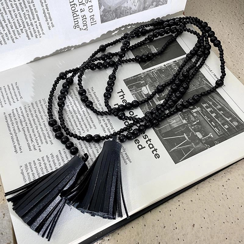 Collana lunga vintage con perline nere e nappa, regalo di Natale o compleanno.