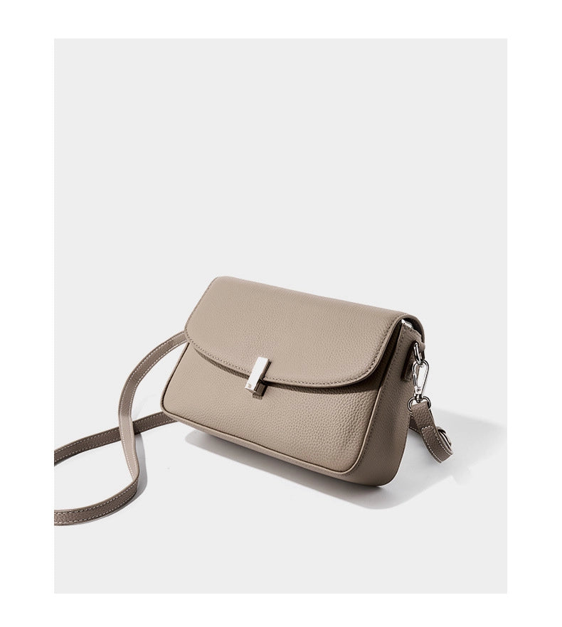 Borsa a tracolla da donna in pelle di vacchetta, colore grigio.