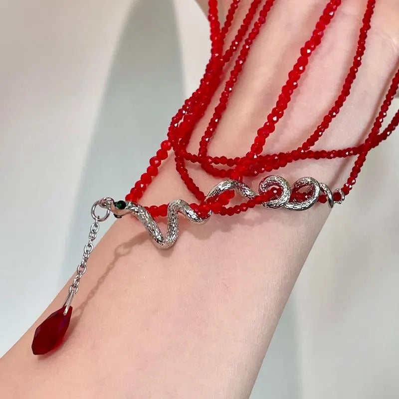 Collana a serpente impilabile con perline di cristallo rosso fatte a mano, regalo di Natale o di compleanno.