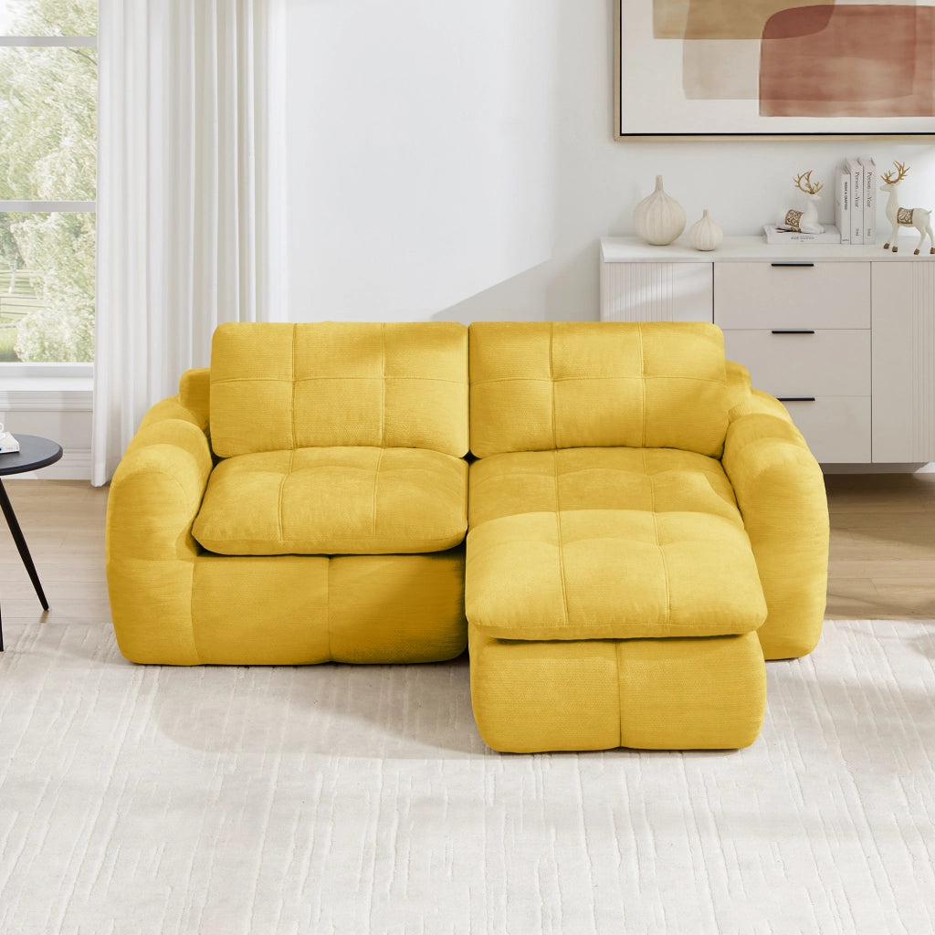 Divano modulare a L 2 posti senza struttura con seduta ergonomica e pouf per salotto e appartamenti in chenille gialla