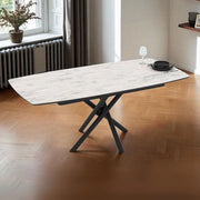 Tavolo allungabile Katrin con piano marmo bianco e gambe a stelo incrociate nere 138/178x90x76H