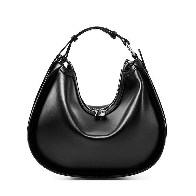 Borsa da donna alla moda in vera pelle, colore nero.