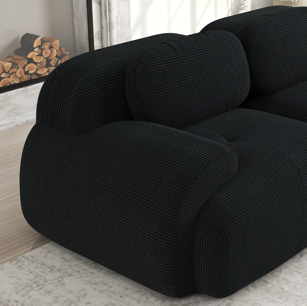 Divano angolare modulare in tessuto a coste con schienale ergonomico; nero