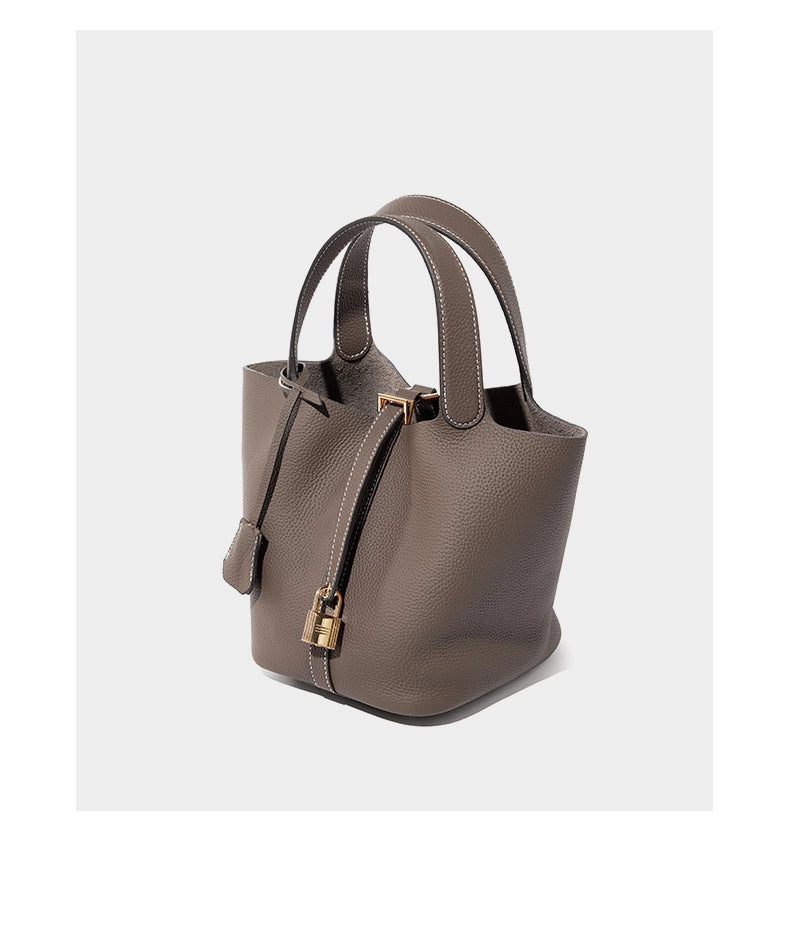 Borsa a mano da donna in vera pelle, a tracolla, modello tote bag, colore grigio.