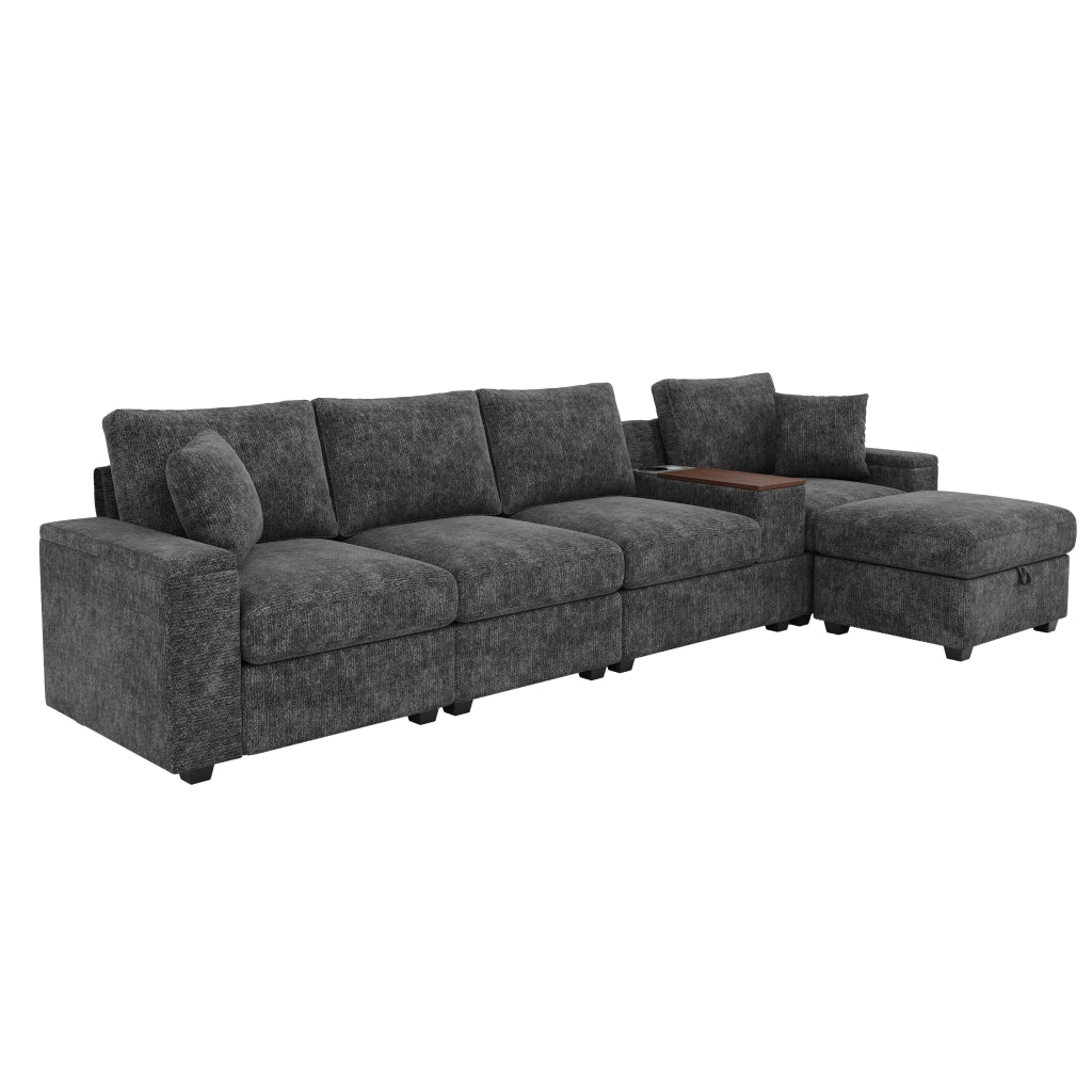 Divano modulare angolare in ciniglia grigia con chaise longue, pouf, porta bicchieri, USB/Type-C e tavolino girevole