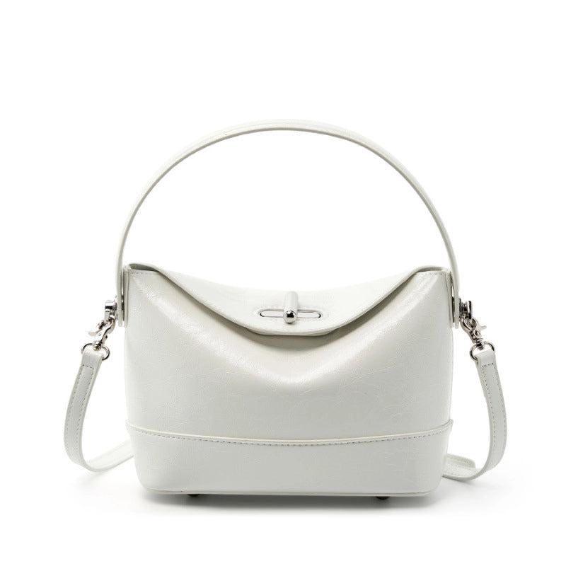 Borsa a mano e borsetta da donna in vera pelle, bianca.