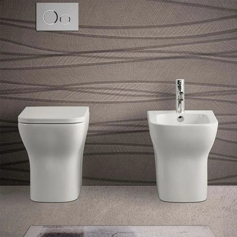Sanitari filomuro senza brida bianco lucido con sedile soft-close  Plana