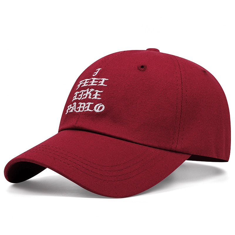 Cappellini da baseball ricamati rossi con la scritta "I FEEL LIKE PABLO"