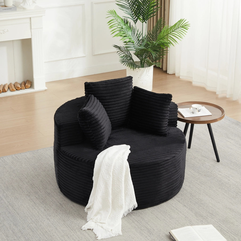 Poltrona lounge rotonda in corduroy nero con 3 cuscini