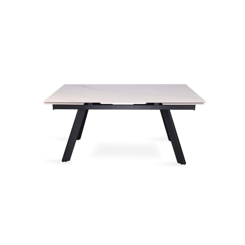 Tavolo da pranzo allungabile per 10 persone con piano in pietra bianca, collezione LAROS. Struttura in metallo.