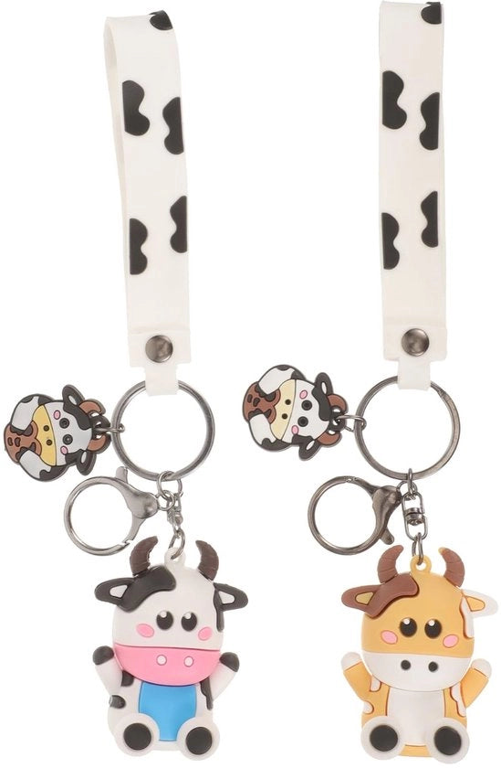 Schiaccianoci con Disegno di Mucca - Decorazione per Portachiavi - Accessorio per Borse - Regalo per Bambini - Diverse Colori - 11,5 x 4,5 cm - Tassello di Regolazione