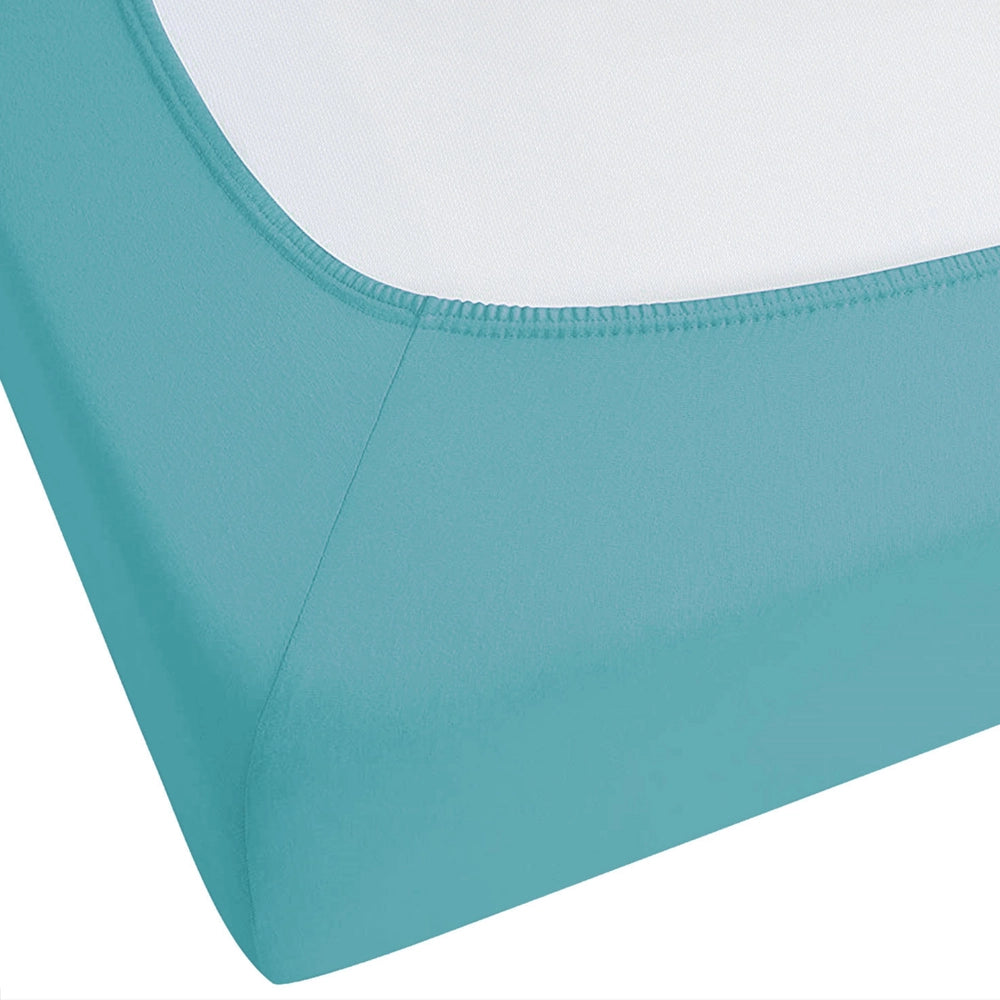 Lenzuolo con angoli cotone turchese 140 x 200 cm coprimaterasso elasticizzato modello classico a tinta unita camera da letto classica