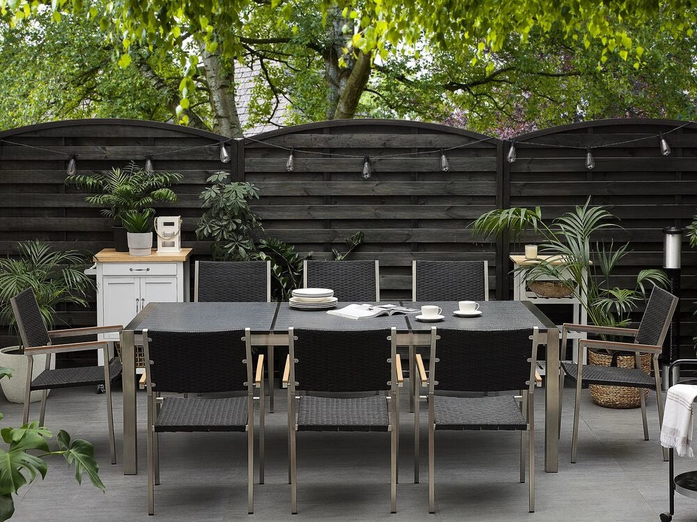 Set da pranzo da giardino Nero con piano in granito fiammato sedie in rattan 8 posti 220 x 100 cm