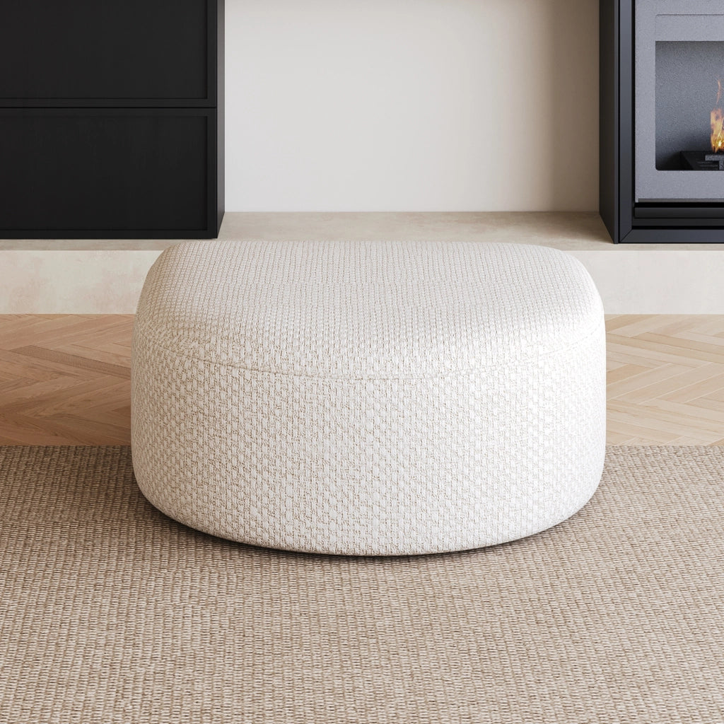 Pouf senza montaggio con linee eleganti e seduta confortevole per soggiorno e camera da letto in tessuto bianco