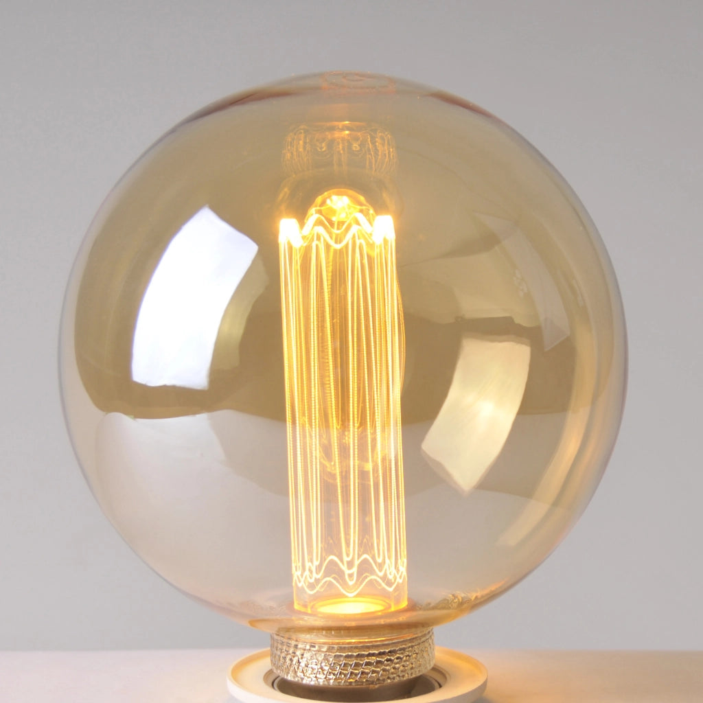 Lampadina LED decorativa G125 ambra E27 4W 1800K Polux