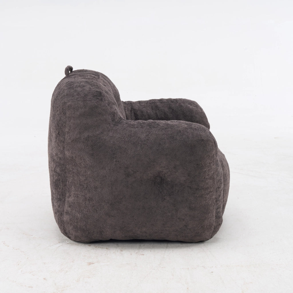 Pouf con imbottitura in schiuma sminuzzata e schienale ergonomico con braccioli, in pelliccia sintetica, grigio scuro