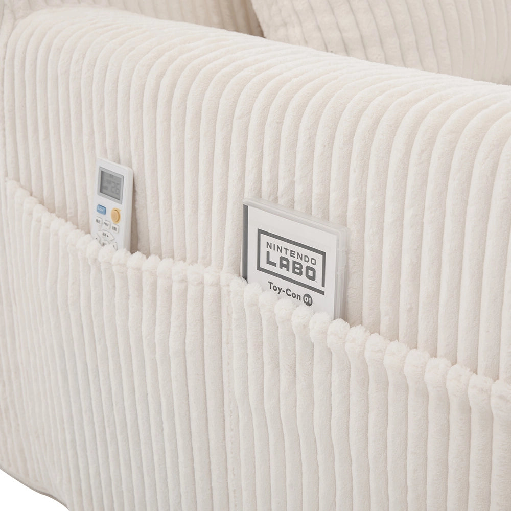 Poltrona oversize - Xylo - Velluto costato con tasche laterali, pouf e nessun assemblaggio