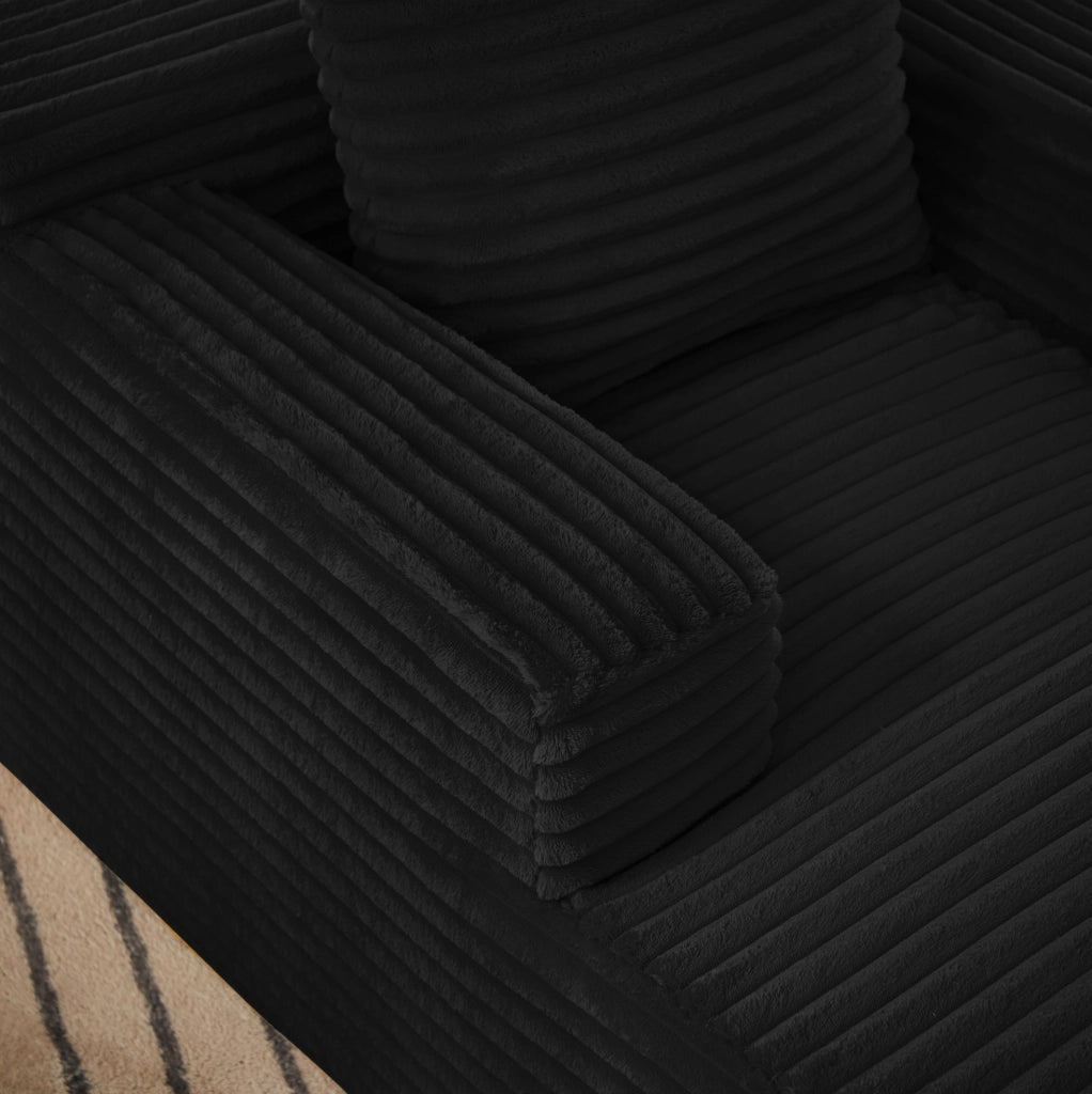 Divano chaise longue in tessuto a coste nero
