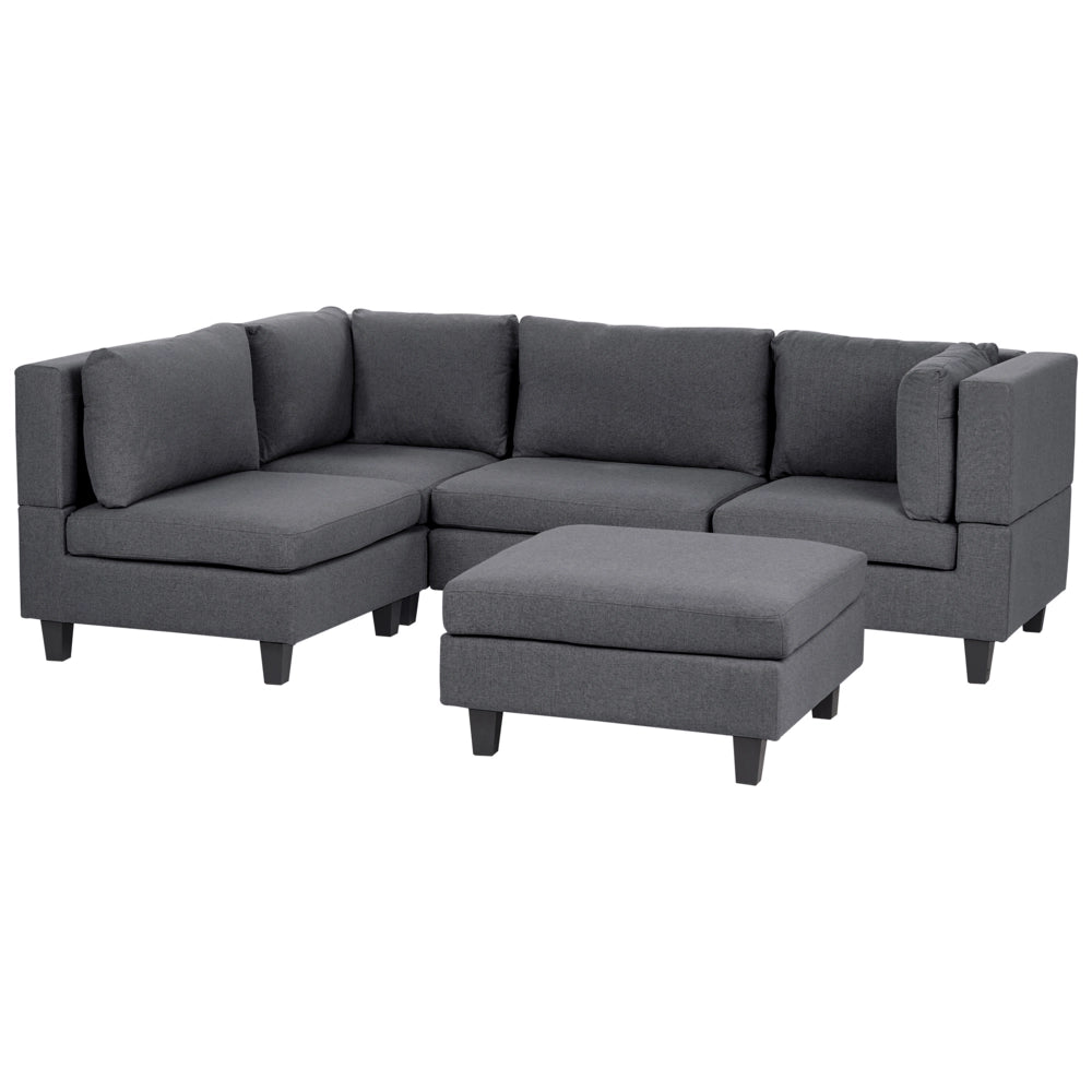 Divano componibile a 4 posti imbottito in tessuto grigio scuro gambe nere lato destro con ottomana stile moderno