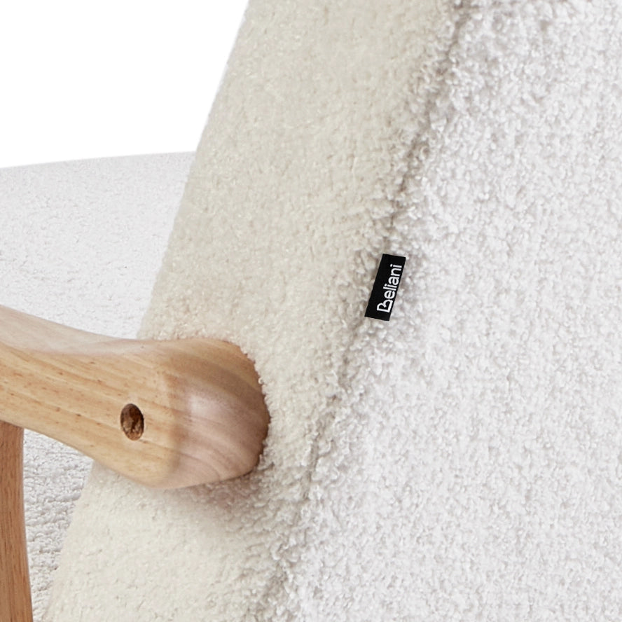 Poltrona a dondolo con rivestimento in bouclé bianco sporco gambe in legno di gomma e braccioli Soggiorno Cameretta