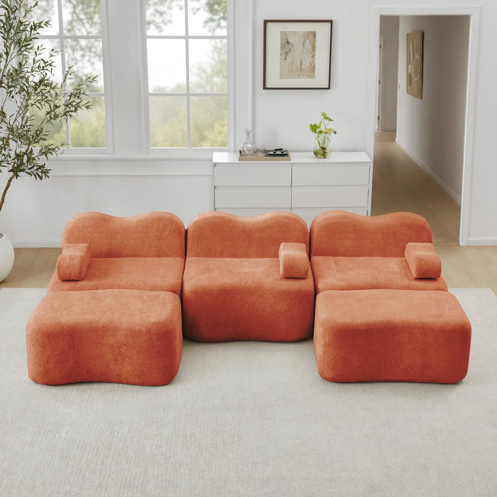 Divano modulare a U 3 posti con 2 pouf seduta profonda design ondulato braccioli mobili in velluto arancione
