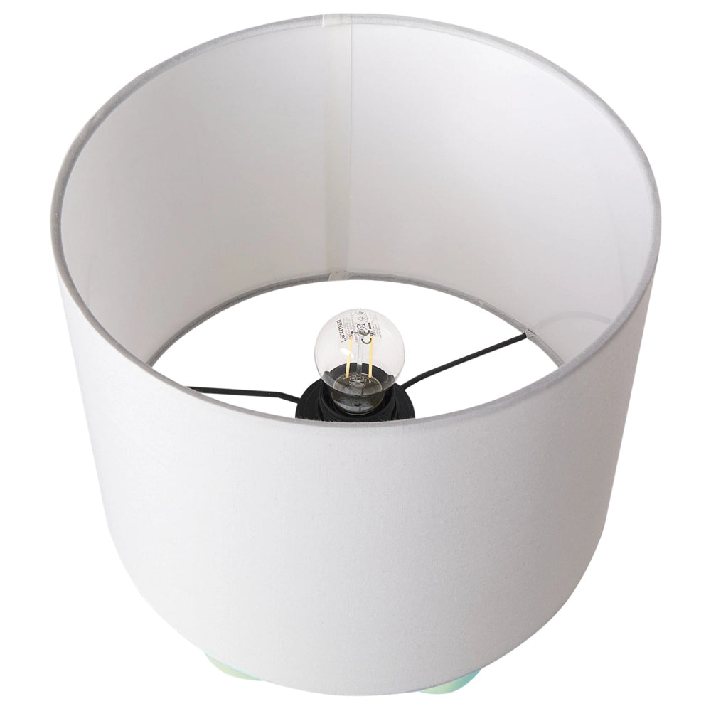 Lampada da tavolo in ceramica verde con paralume a tamburo in lino base minimalista design stile contemporaneo