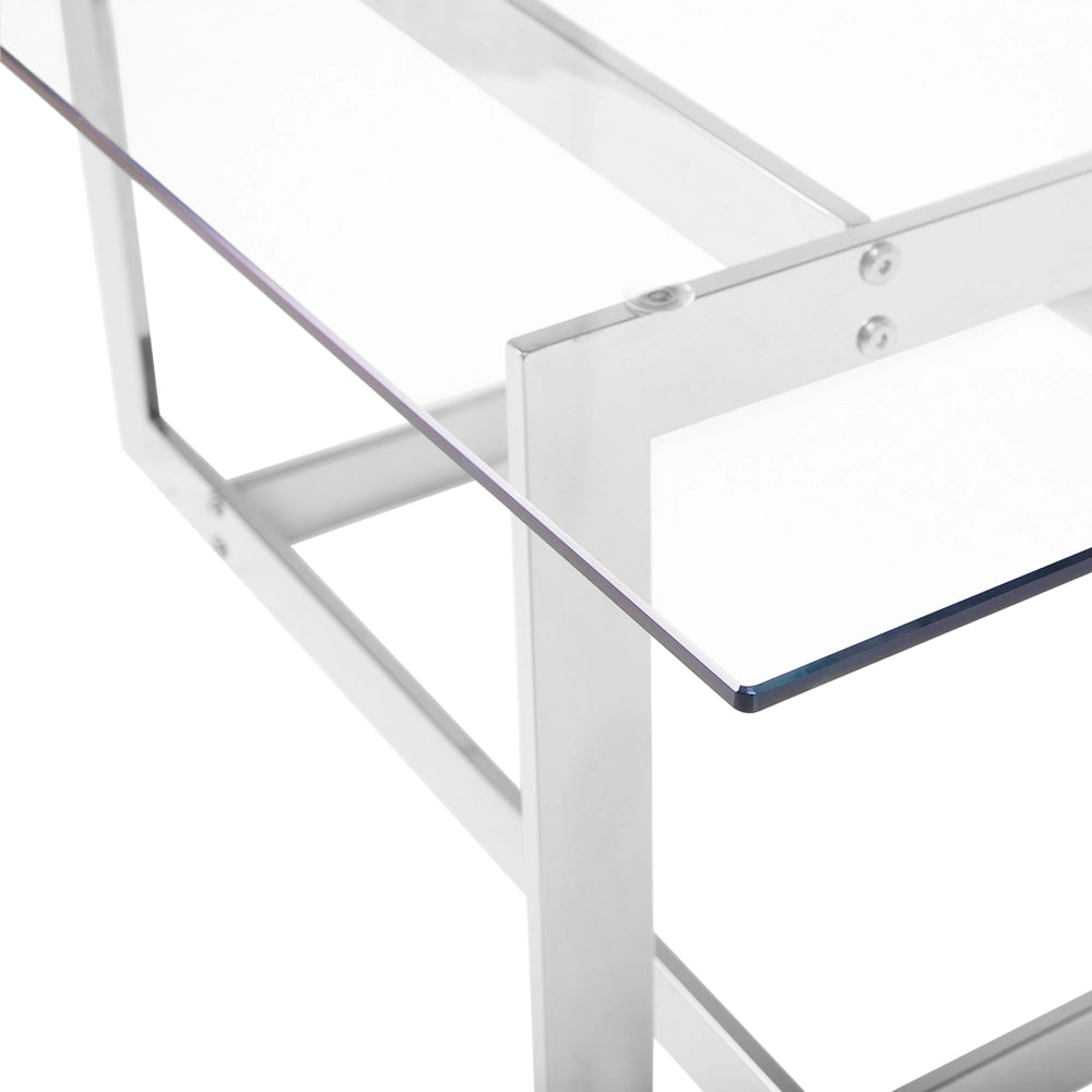 Tavolino da caffè con struttura in metallo argento piano quadrato in vetro design geometrico glam