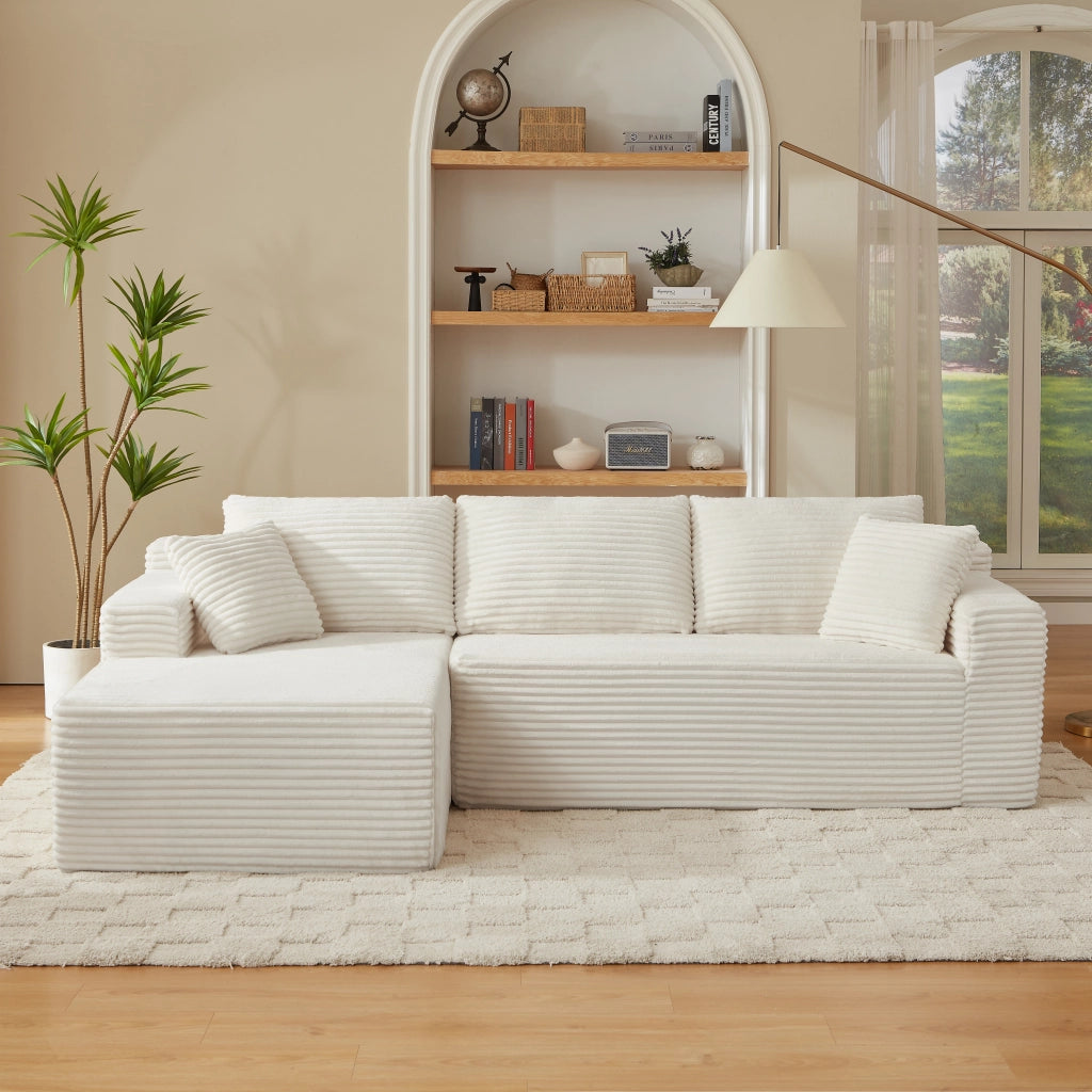 Divano modulare a L con sedute ampie e cuscini sfoderabili in schiuma e molle per salotto bianco 252.5 × 163.0 × 65.0 cm