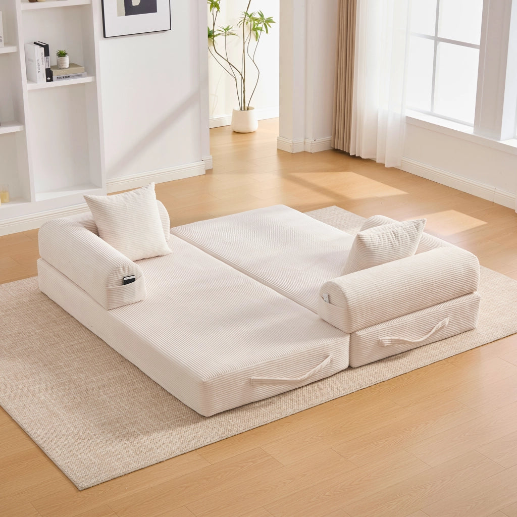 Divano modulare beige in velluto a coste con struttura in metallo; tasca laterale e 3 cuscini