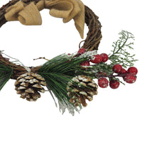 Ghirlanda natalizia con bacche e pigne cm 30