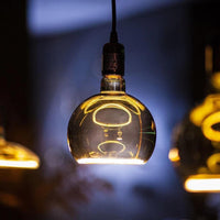 Lampadina design MOON lampada LED E27 6W dimmerabile vetro fume luce gialla 1900K bar pub diametro 120mm