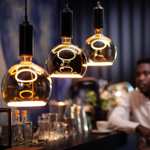 Lampadina design MOON lampada LED E27 8W dimmerabile vetro fume luce gialla 1900K ristorante bar diametro 300mm