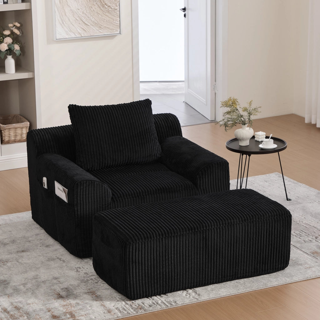 Poltrona Oversize con Poggiapiedi e Tasche Laterali; Seduta Profonda; Poltrona Imbottita in Velluto a Coste Nero
