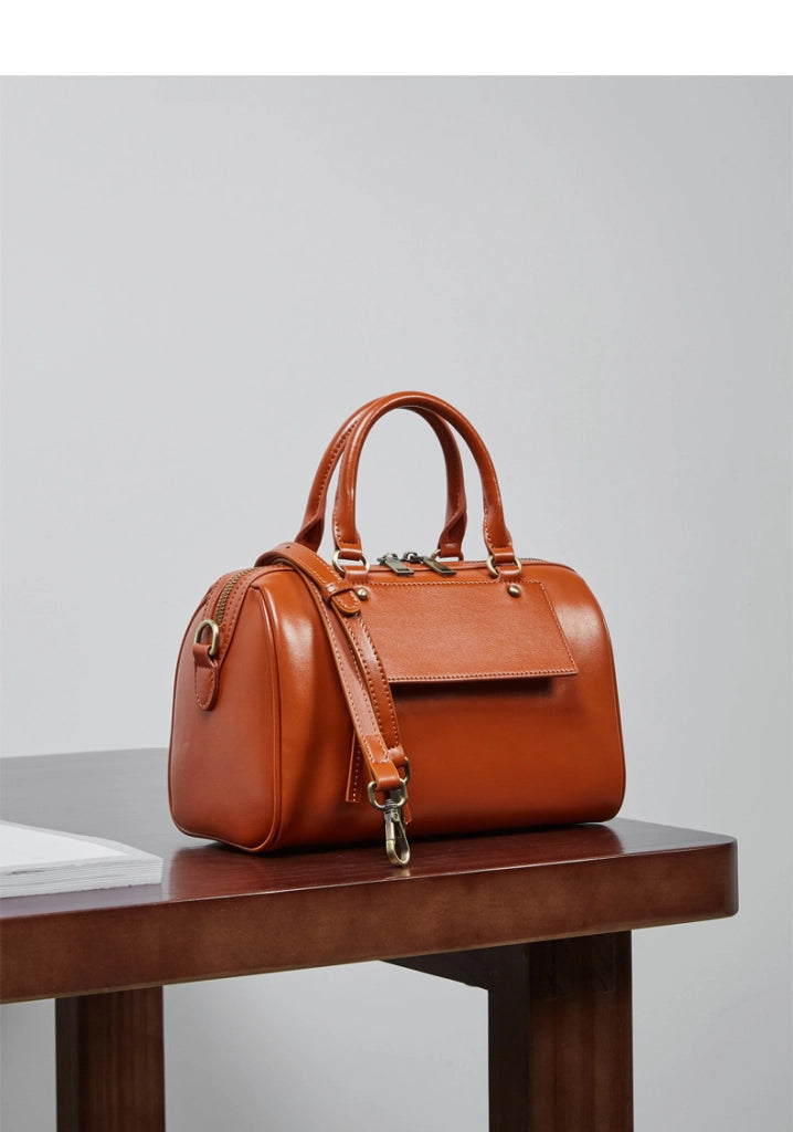 Borsa a tracolla da donna in vera pelle, colore arancione.