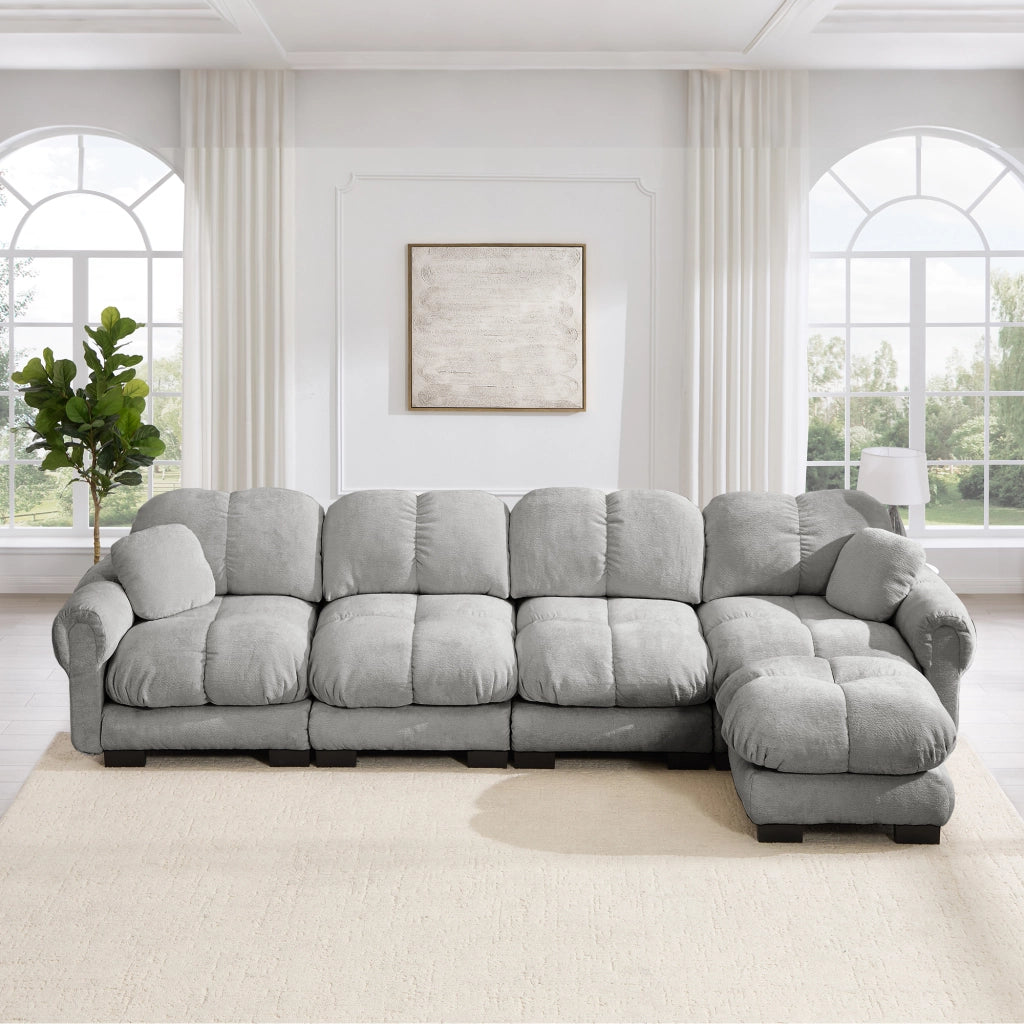 Divano angolare modulare a l con pouf mobile e cuciture trapuntate in tessuto chenille grigio chiaro 330 × 149 × 90 cm