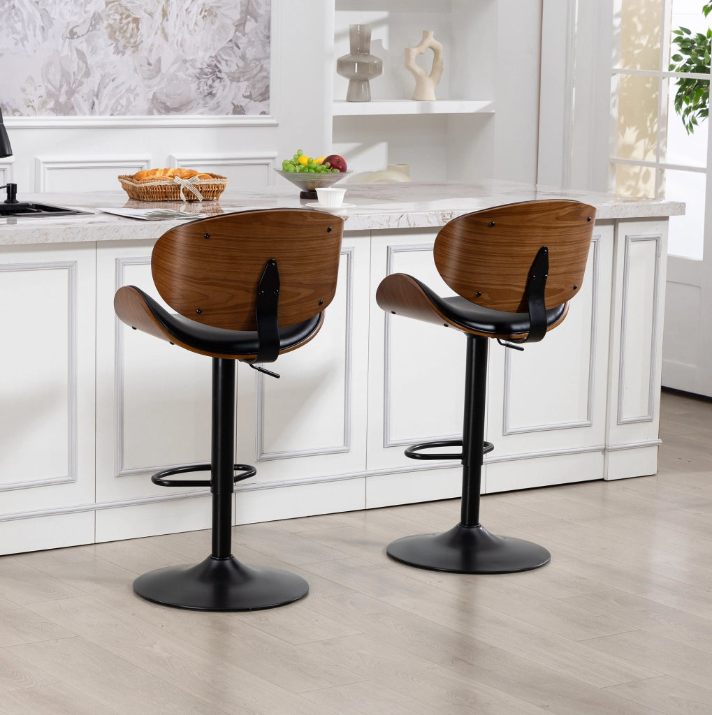 Sgabello da bar girevole 360° regolabile in altezza; in PU nero con schienale ergonomico