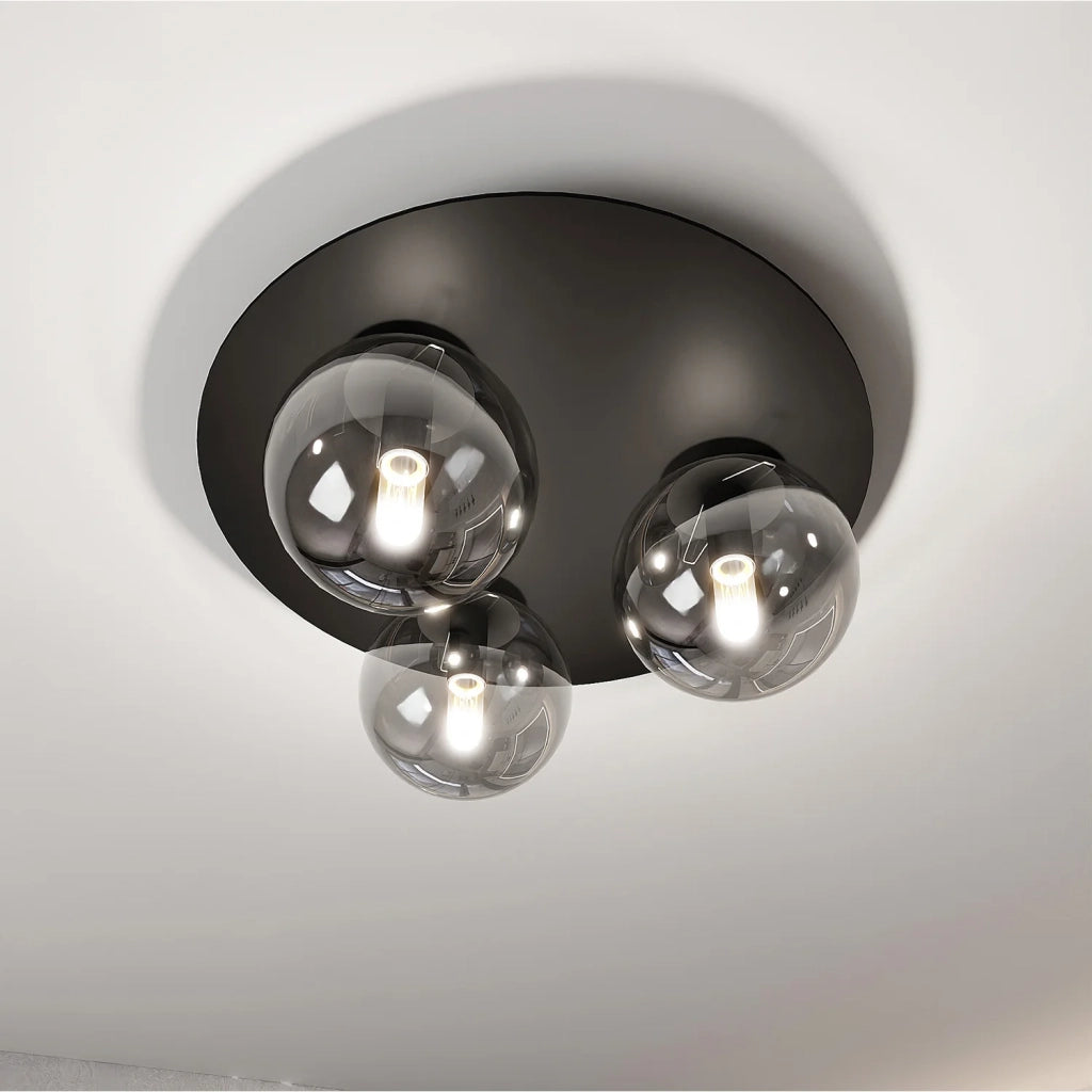 Plafoniera Minimal 3 Luci Mnemosine In Acciaio Nero E Sfere Di Vetro Fumè