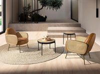 Tavolino rotondo in rattan, legno nero e acciaio nero