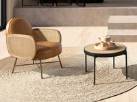 Tavolino rotondo in rattan, legno nero e acciaio nero