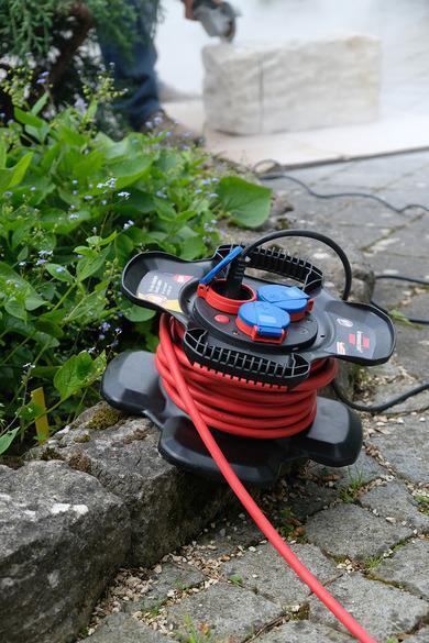 Brennenstuhl 1169710100 prolunghe e multiple 10 m 3 presa(e) AC Esterno Nero, Rosso