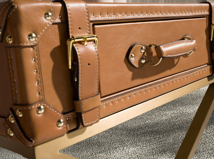 Tavolino rettangolare in pelle e acciaio dorato