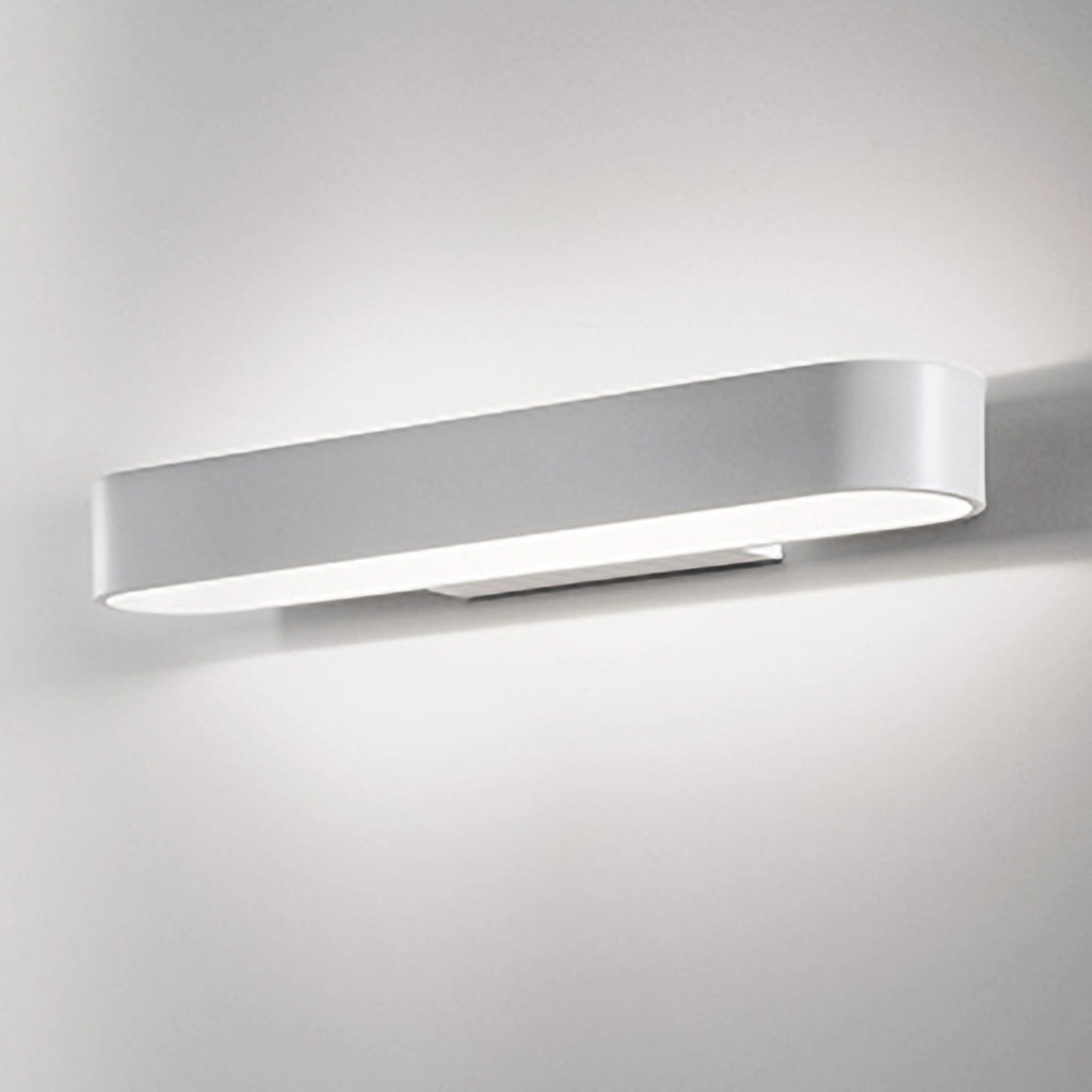 Lampada da parete Cip in alluminio pressofuso bianco opaco, design minimalista e moderno con tecnologia LED integrata da 12.5W, 3000K, 26x5x11 cm