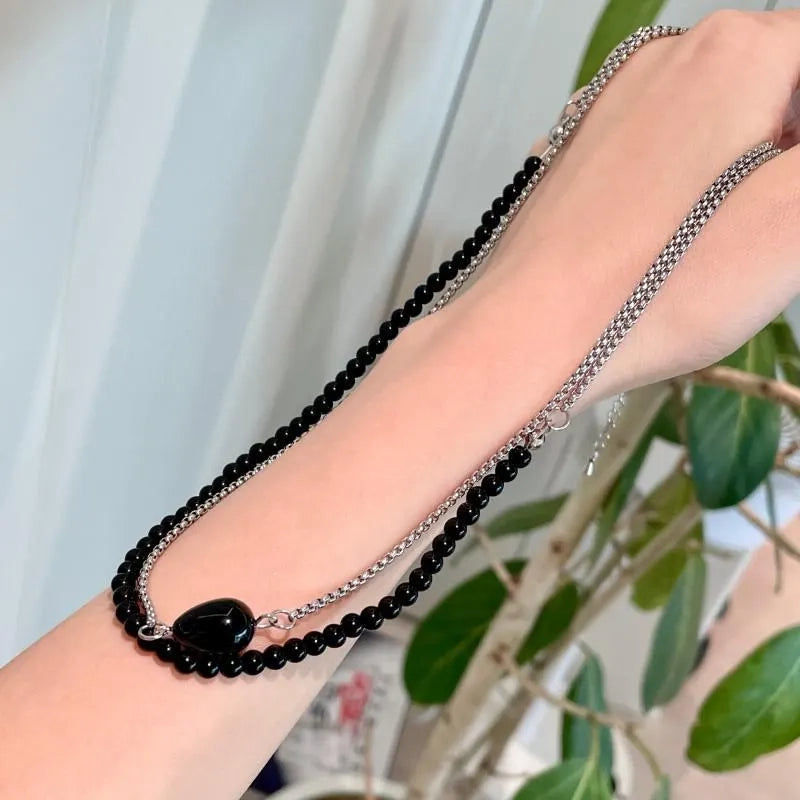 Collana patchwork di perle nere fatta a mano, regalo di Natale o di compleanno.