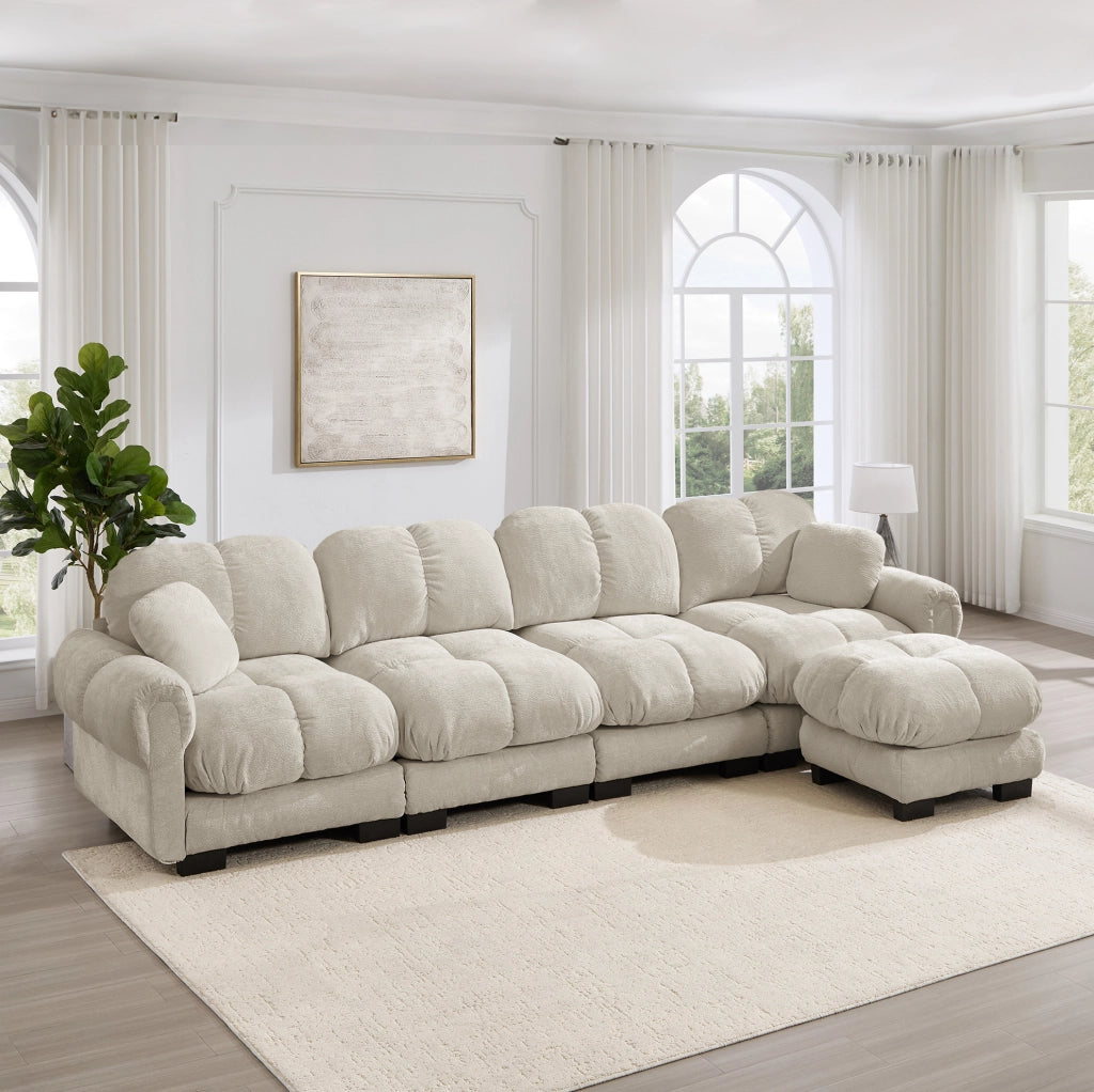 Divano angolare a L 4 posti con pouf mobile 330x149x90 cm in chenille; light khaki