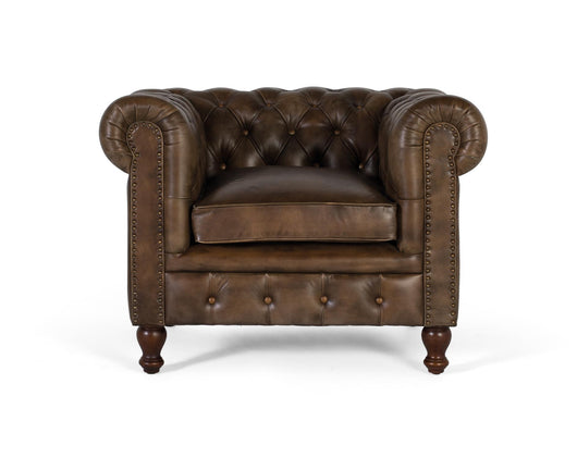 Poltrona Chester realizzata in pelle con finitura capitonné